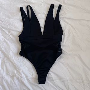 Black mesh paneling bodysuit